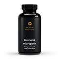 Schwarze Dose Curcuma mit Piperin von THE VITAL MANUFACTURE, 60 vegane Kapseln ohne Zusatzstoffe, 600 mg Curcuma Pulver pro Tagesdosis.