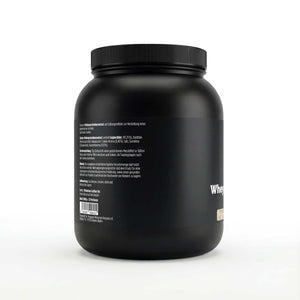 Schwarze Dose des Whey Protein Cookies von THE VITAL MANUFACTURE, 1000g Inhalt, mit Abbildung von Schoko-Keksen und Angabe von 23g Protein pro Portion.